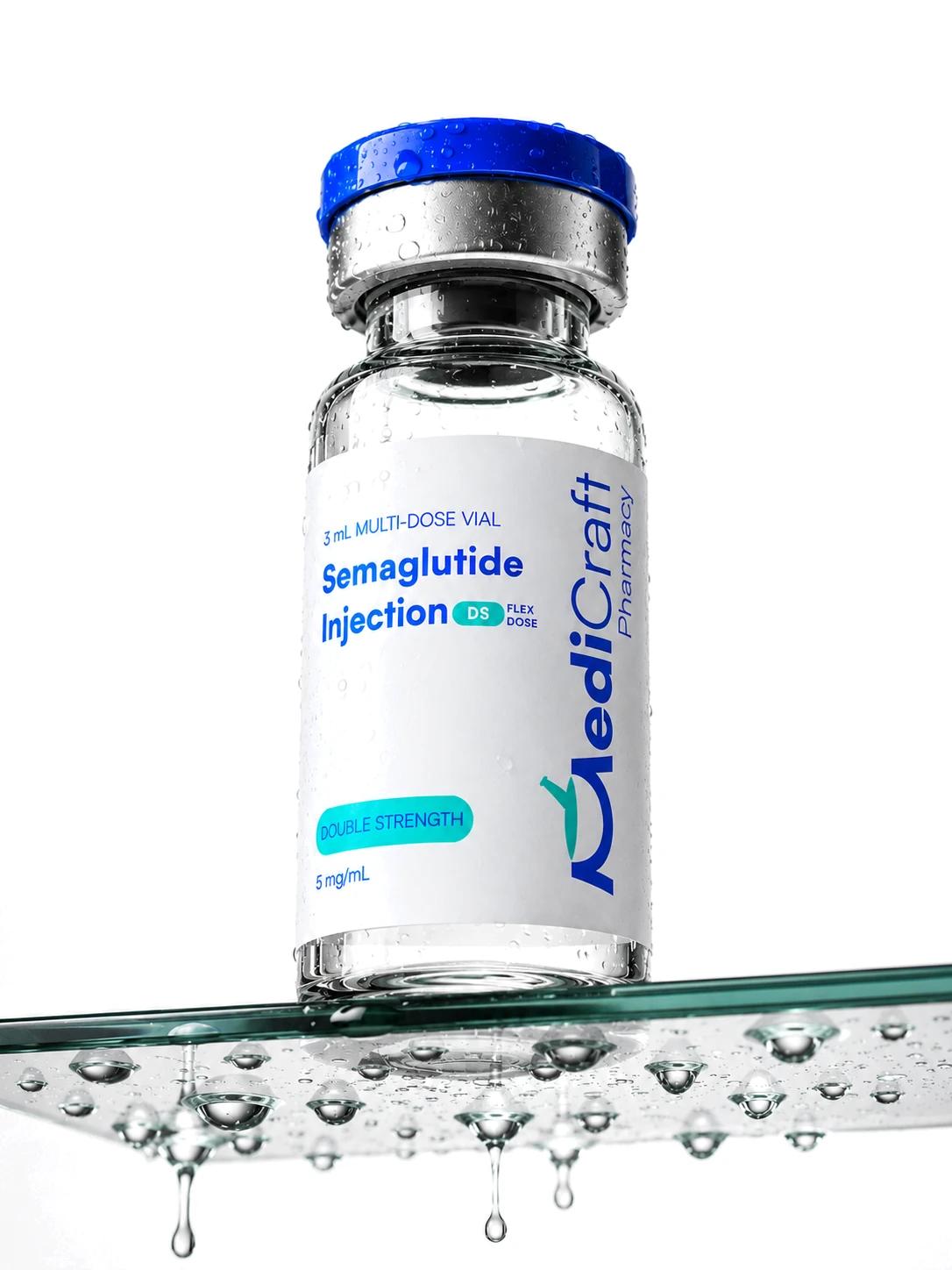 A clear compounded preparation vial on a glass shelf
